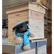 Ours en peluche en combinaison d'apiculteur